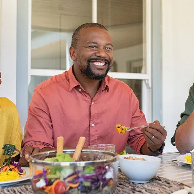 man eating salad