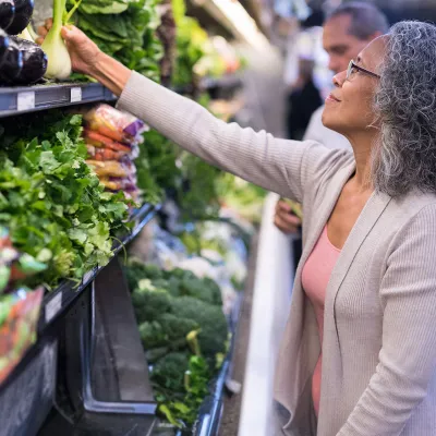 woman shopping for veggies
