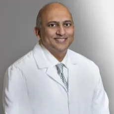 Thomas John, MD