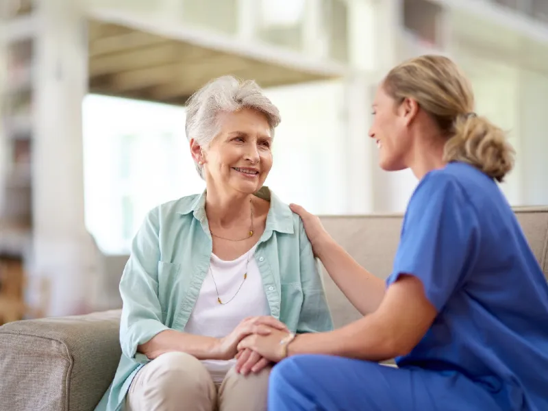 Older woman with a nurse.