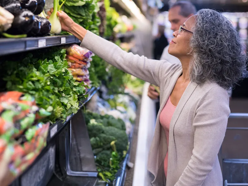 woman shopping for veggies