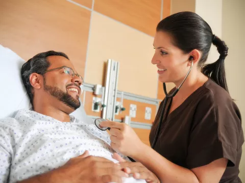Nurse helps a patient