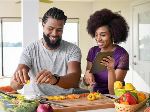 Couple cooking healthy food
