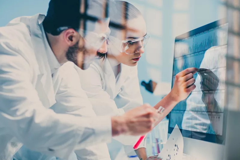 Physicians looking at scan results.