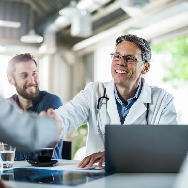 Doctor speaking to corporate