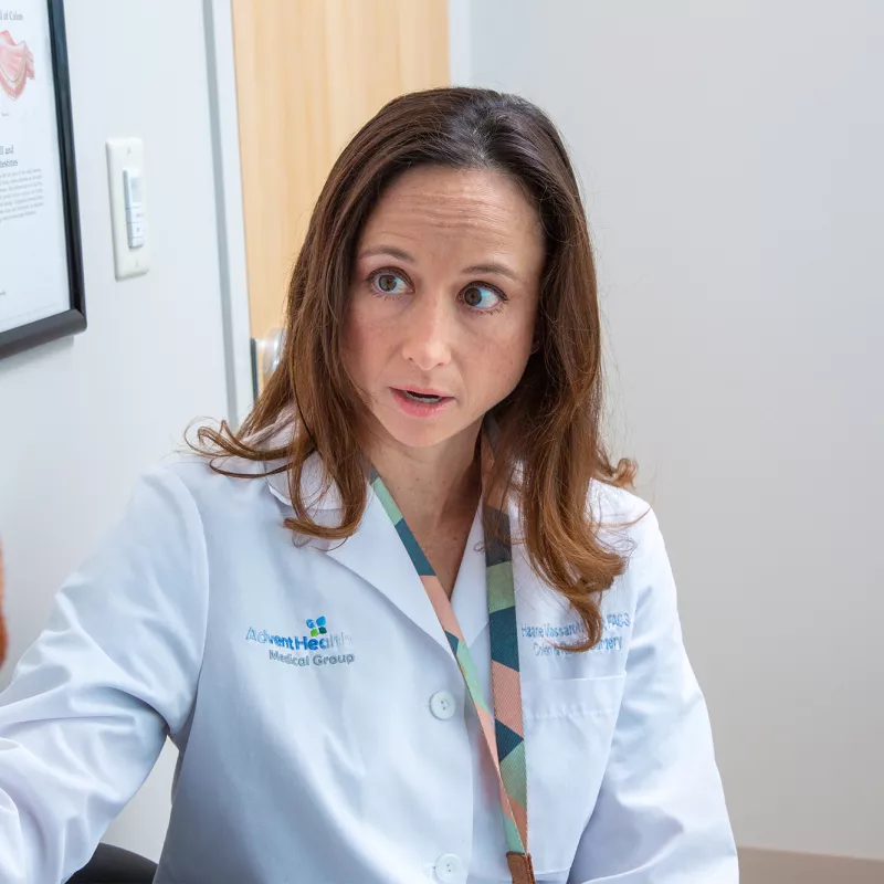 Haane Massarotti talking with a patient at an appointment at AdventHealth Digestive Health Institute Tampa.