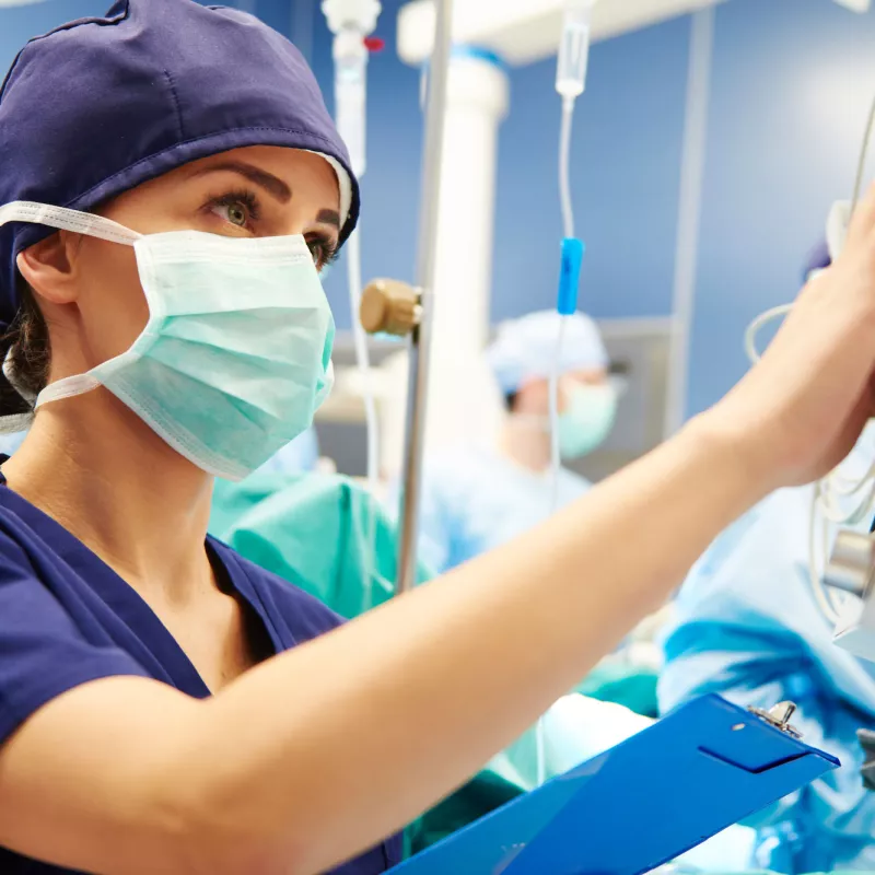 A nurse wearing a mask