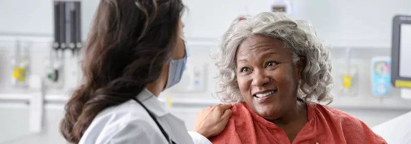 Older Woman Talking with Doctor