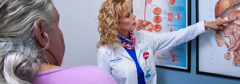 Sharona Ross showing patient diagram at an appointment at the AdventHealth Digestive Health Institute.