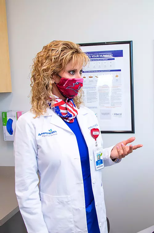 Dr. Sharona Ross and patient wearing masks at an appointment at AdventHealth Digestive Health Institute Tampa.